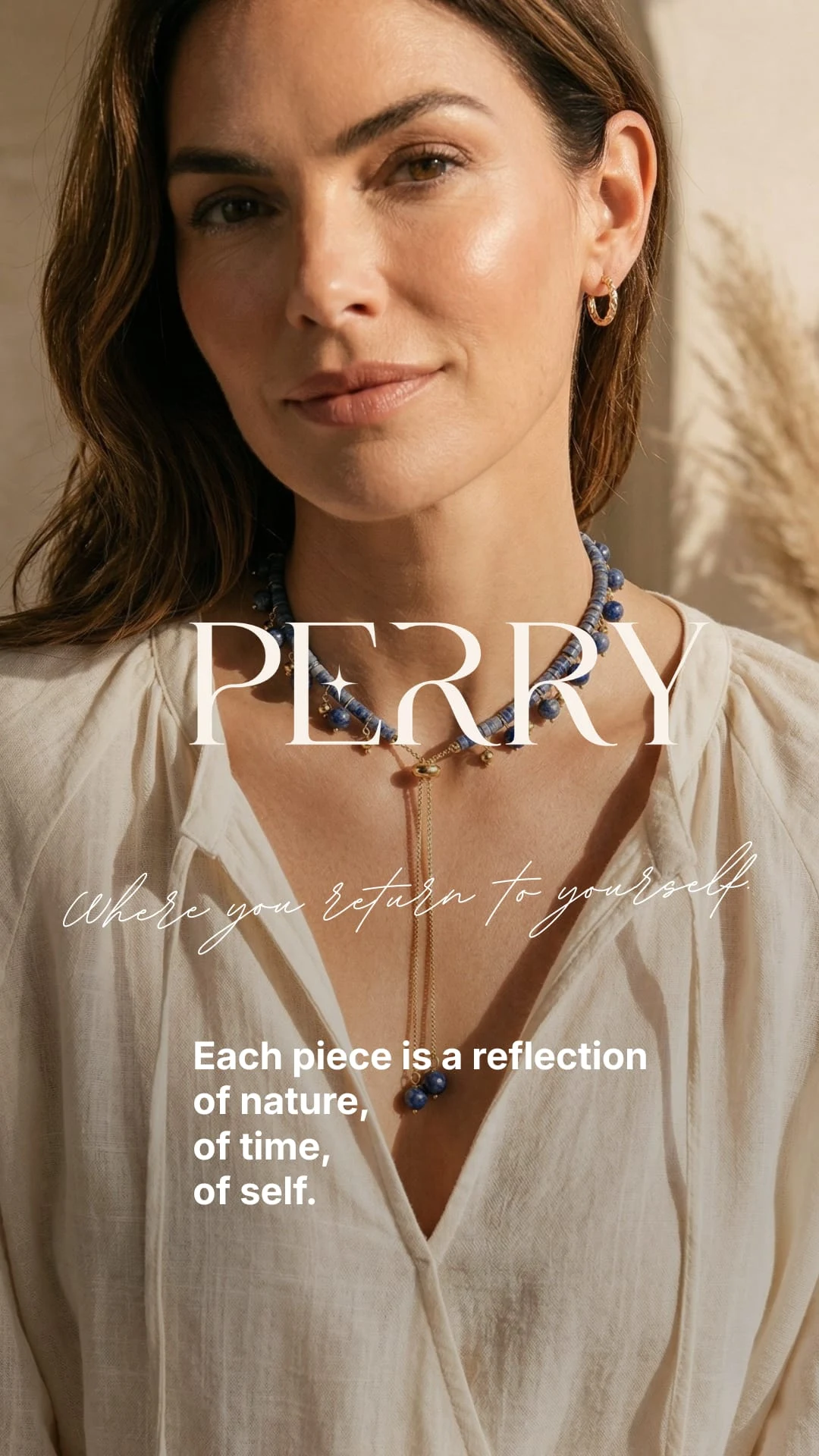 Perry jewellery campaign featuring blue stone necklaces, with the words “Where you return to yourself”